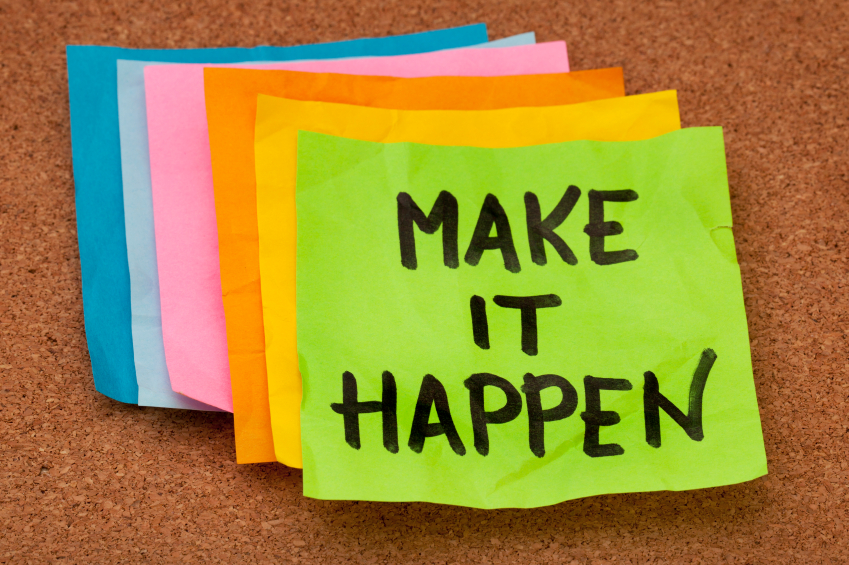 make it happen, motivational slogan, colorful sticky notes on cork bulletin board