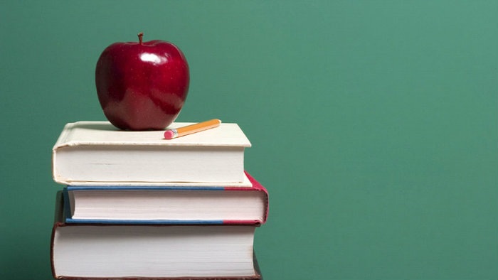 Apples-on-some-books-lessons